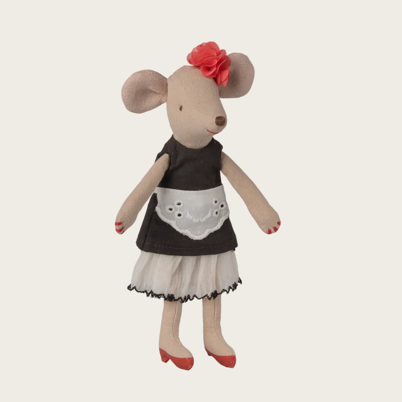 Stuffed mouse toy with a black dress and red shoes 