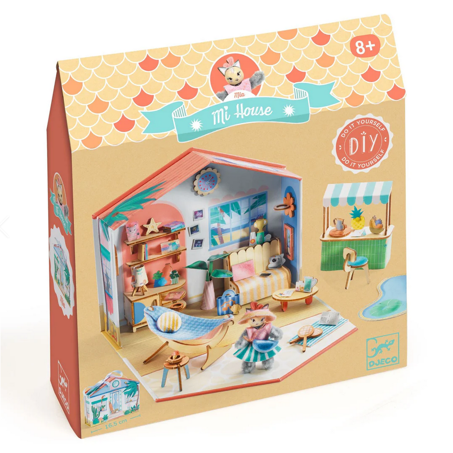 Toy house packaging with colorful interior illustration on a white background