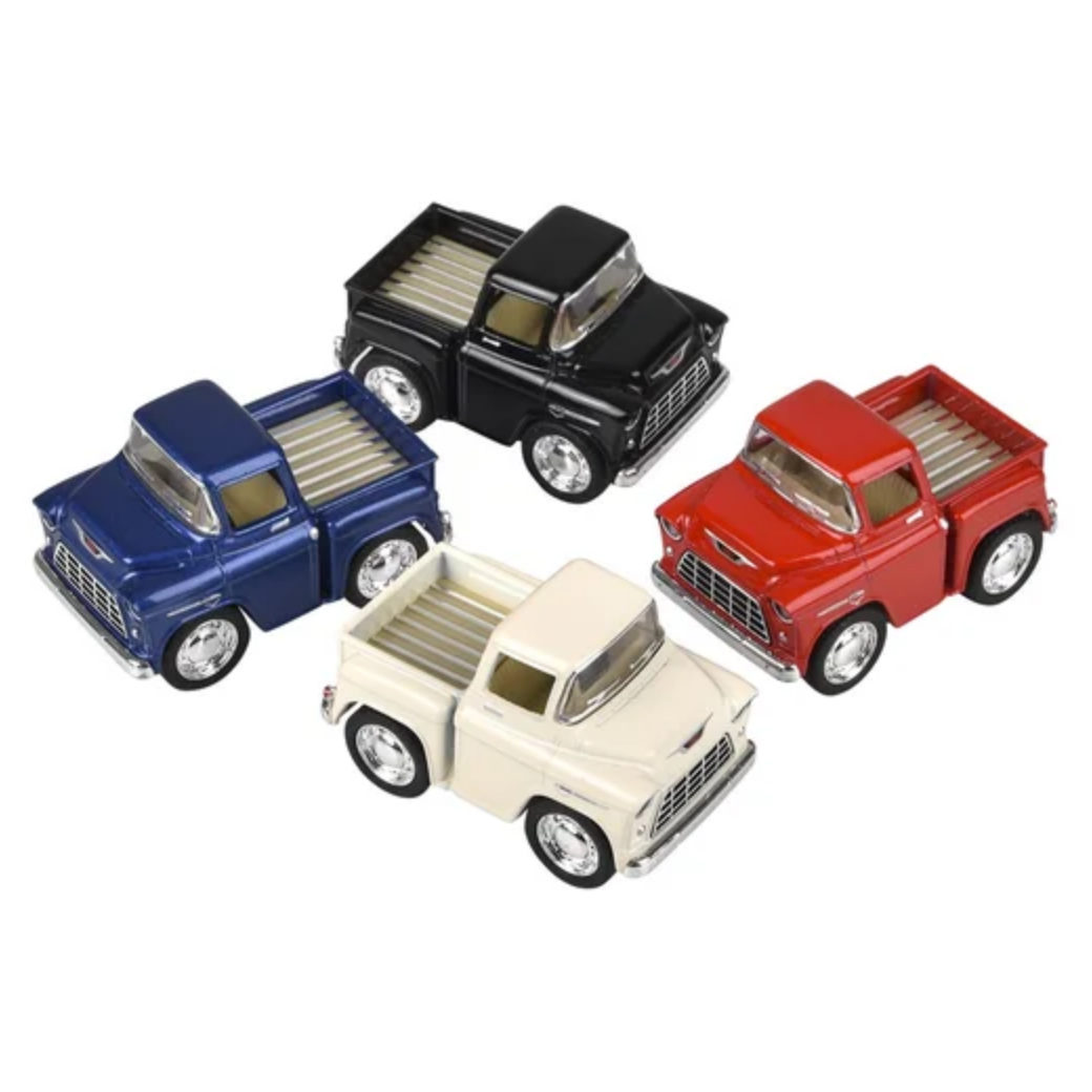 Four toy trucks in blue, black, red, and beige on a white background.