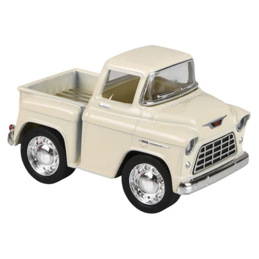 Model of a vintage cream-colored pickup truck on a white background