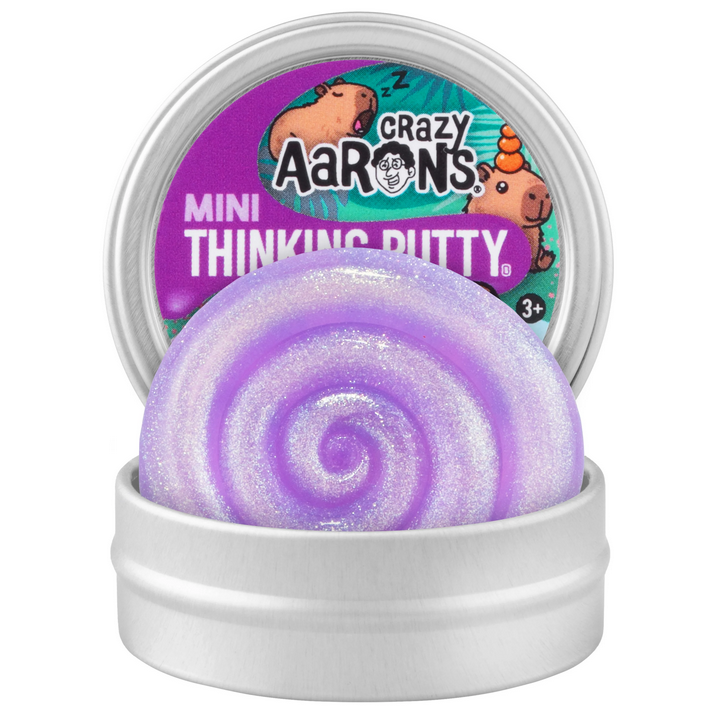 Purple and white striped thinking putty in a container with 'Crazy Aaron's' branding.