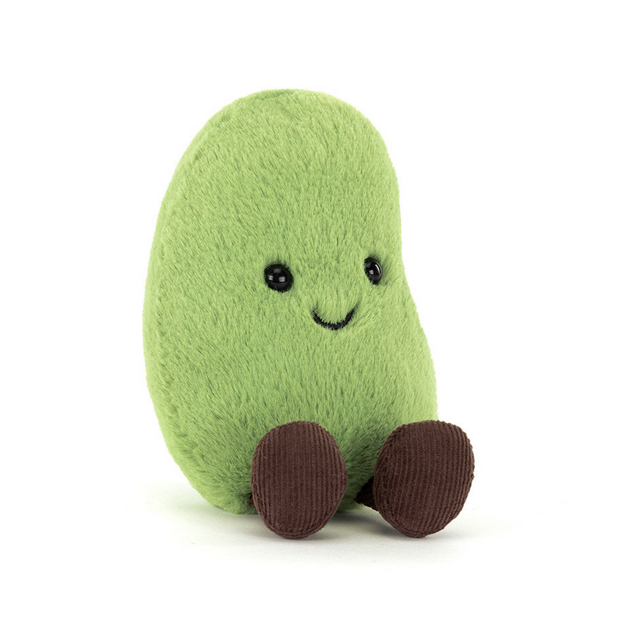 Plush avocado toy with a smiling face on a white background