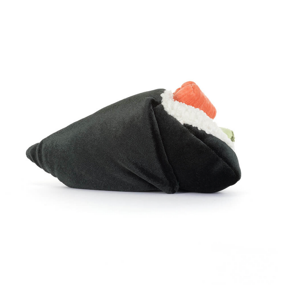 Black sushi with a white and orange interior on a white background