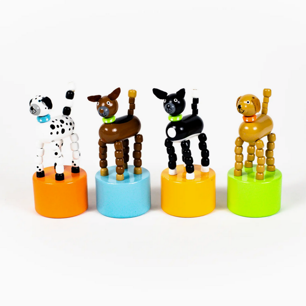 Set of five colorful animal figurines on cylindrical stands against a white background