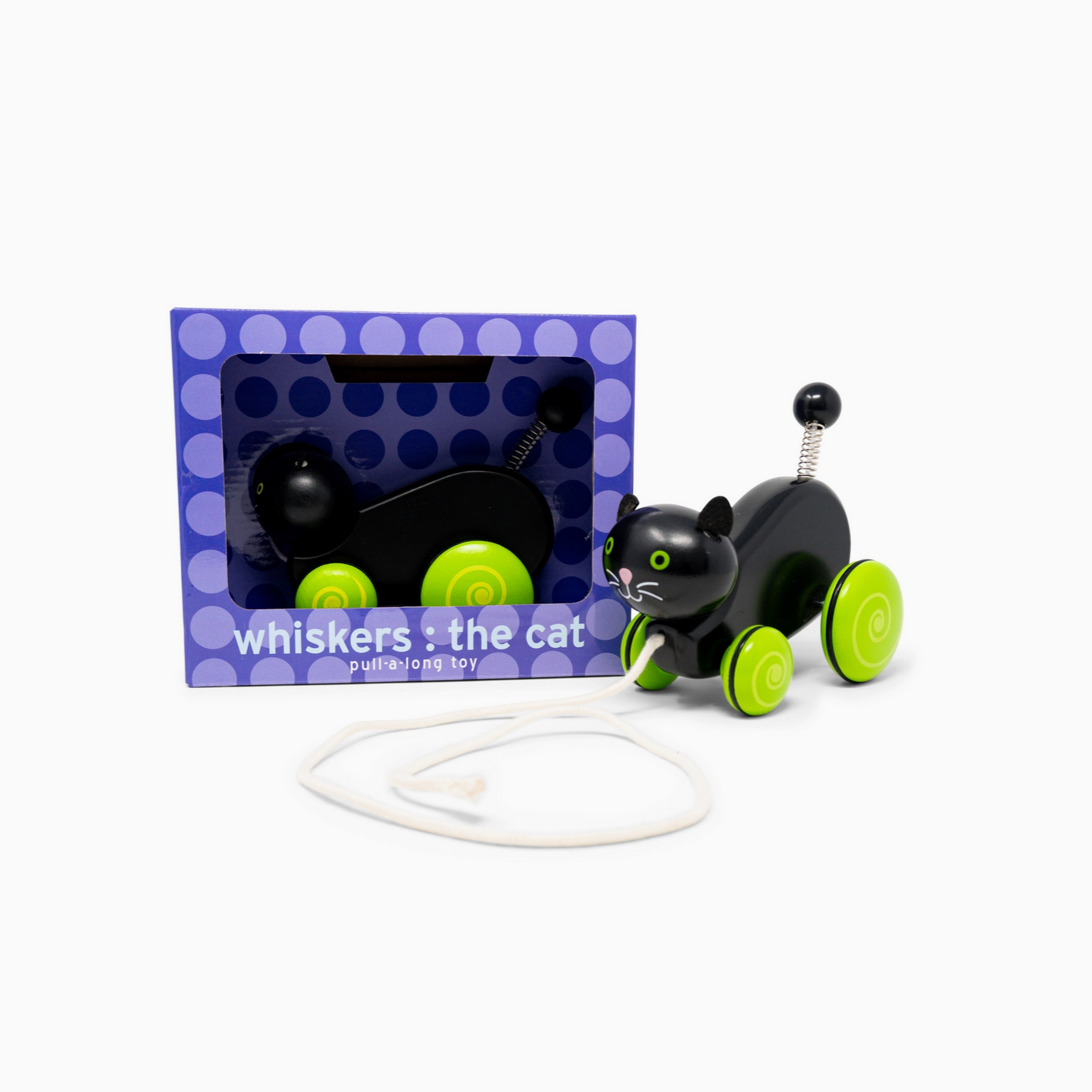 Black and green cat-shaped toy with a blue polka dot box labeled 'Whiskers the Cat' on a white background.