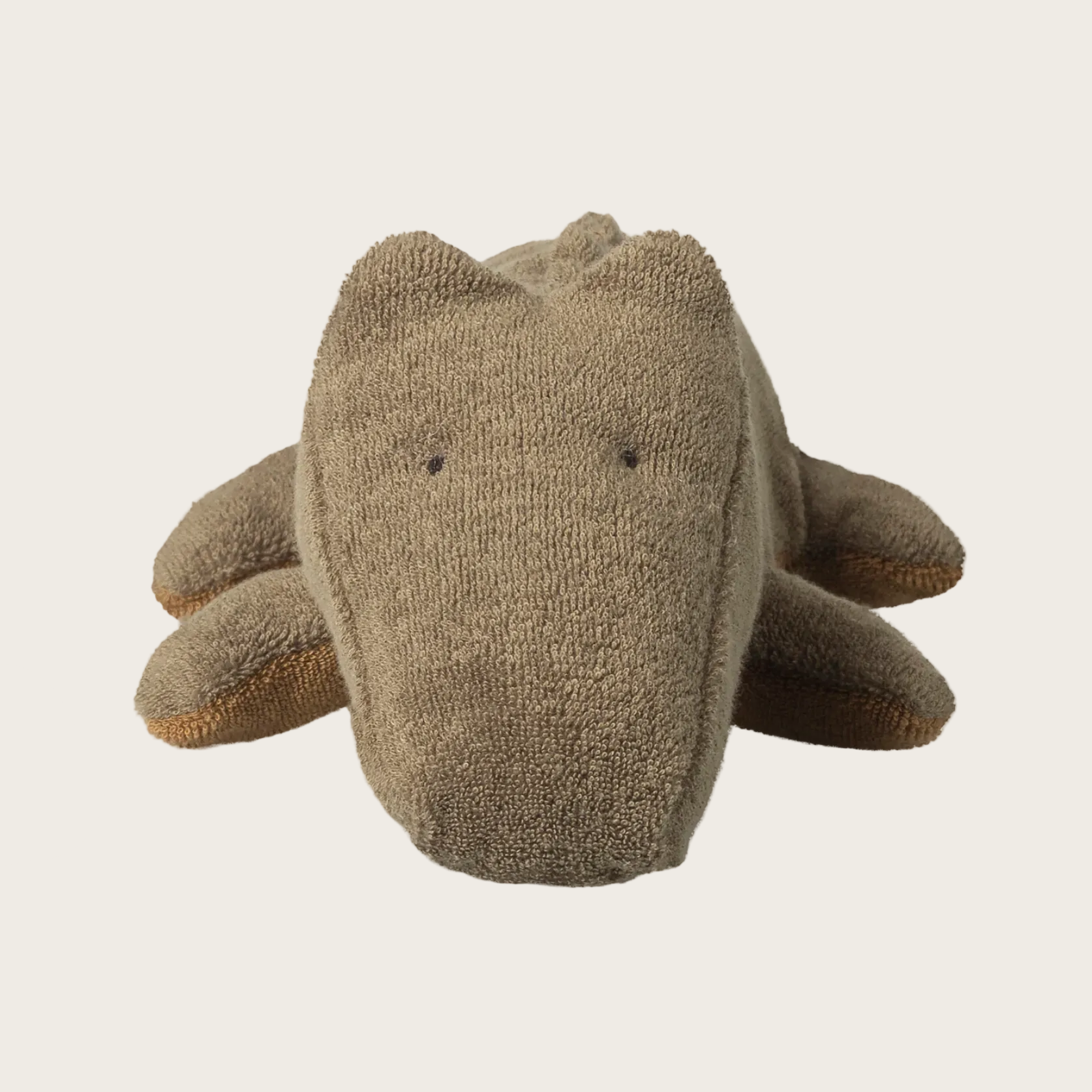 Brown stuffed crocodile toy
