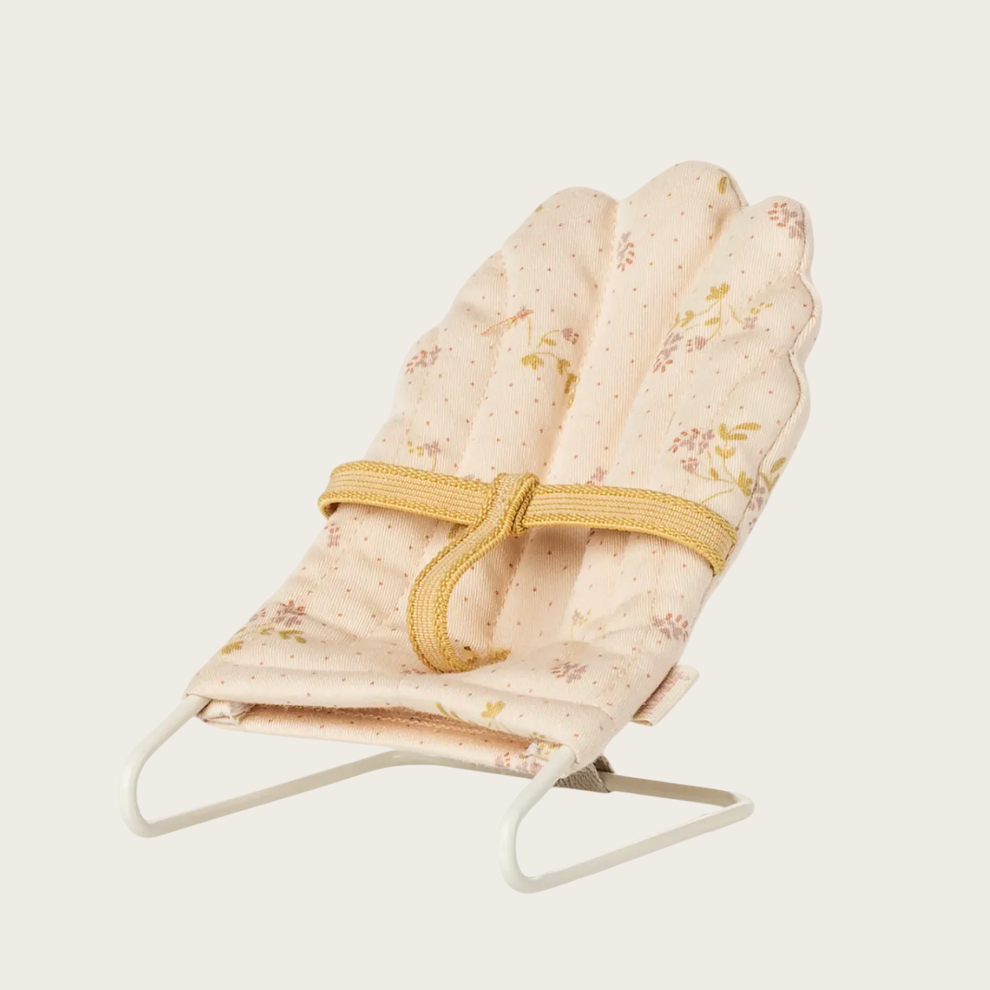 Baby bouncer with floral design
