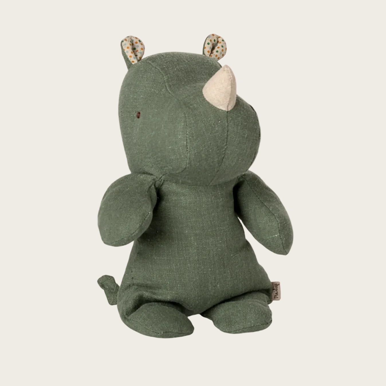 Green stuffed animal toy 