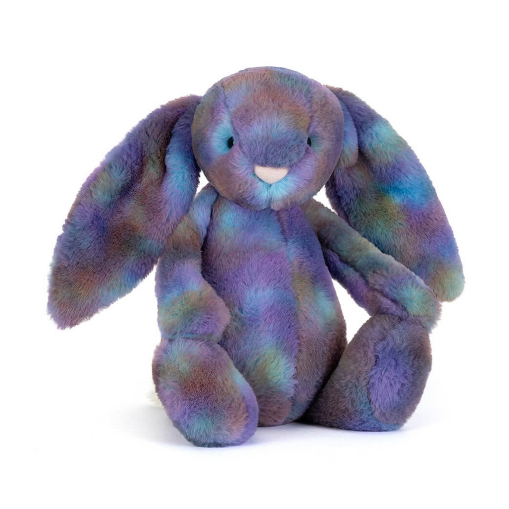 Plush bunny toy with a multicolored pattern on a white background