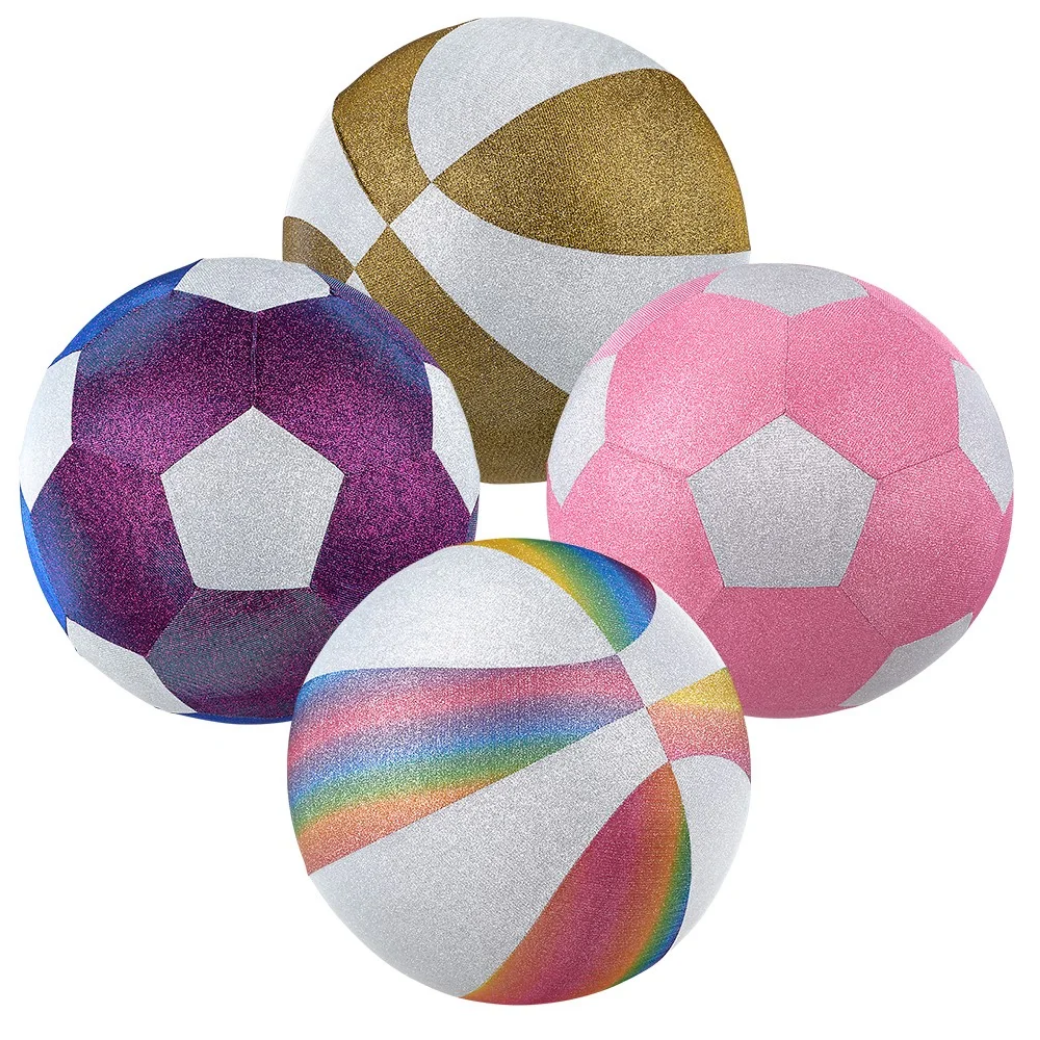 Four colorful beach balls with different patterns on a white background