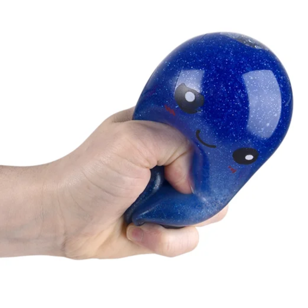 Blue捏力器 held by a hand with 'Rhode Island Novelty' branding.
