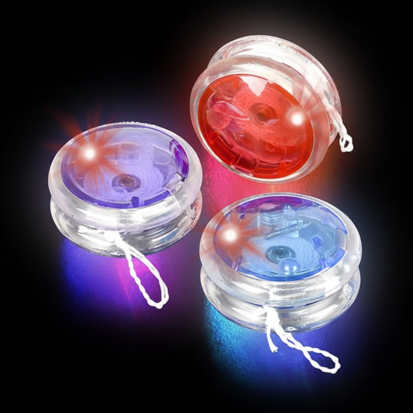 Three LED yoyos in red, blue, and clear with a Rhode Island Novelty label on a dark background.