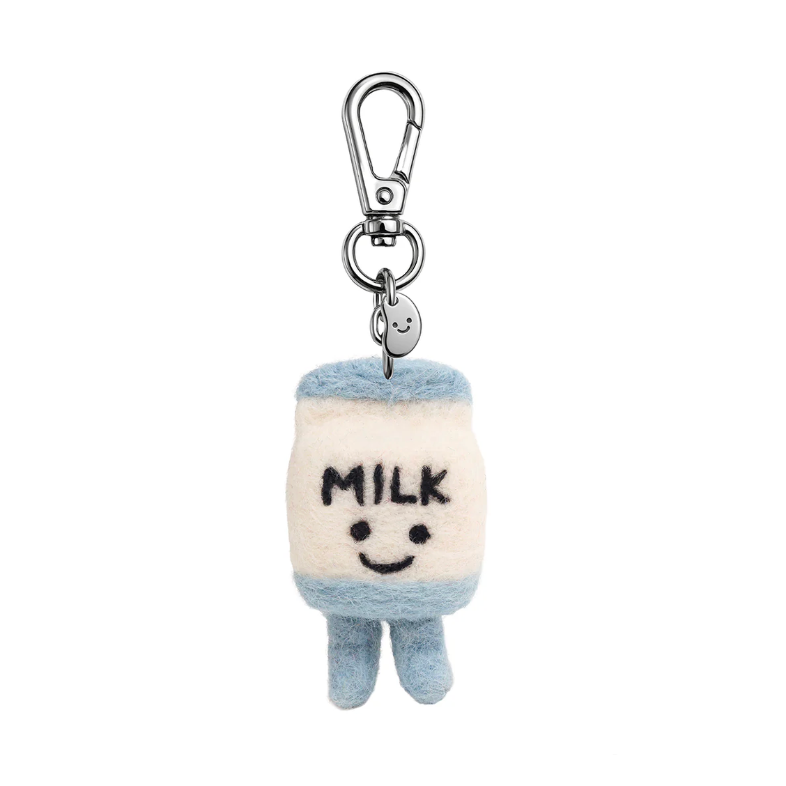 Plush keychain shaped like a milk carton with a smiling face and 'Milk' text, attached to a metal clip on a white background.