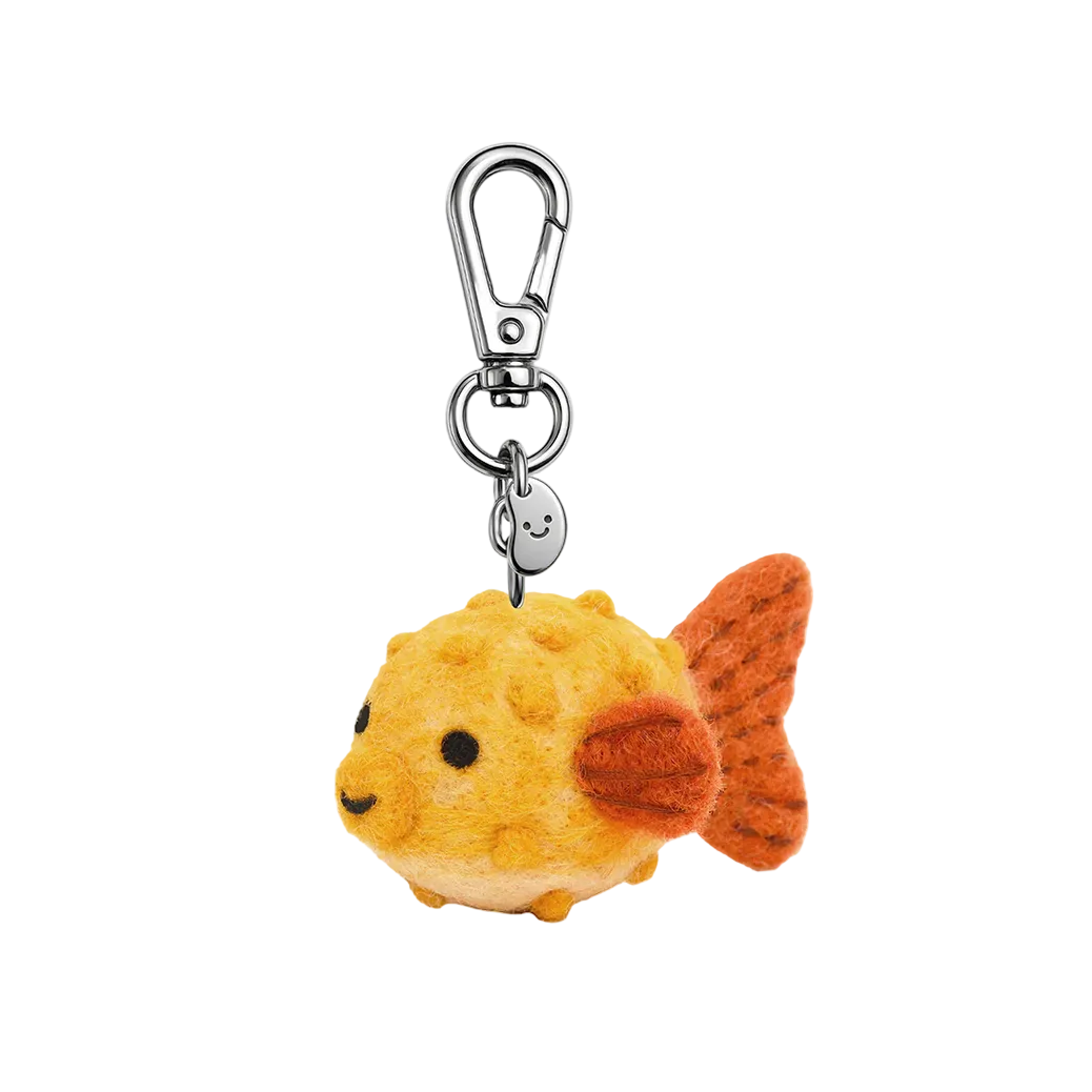 Plush goldfish keychain with a clip on a white background