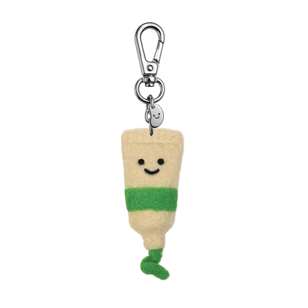 Plush keychain with a smiling face, beige body, and green accents on a white background.