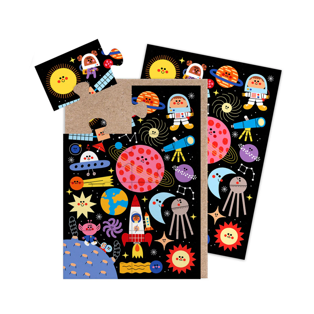 space-themed greeting cards with astronauts, planets, and rockets on a black background.