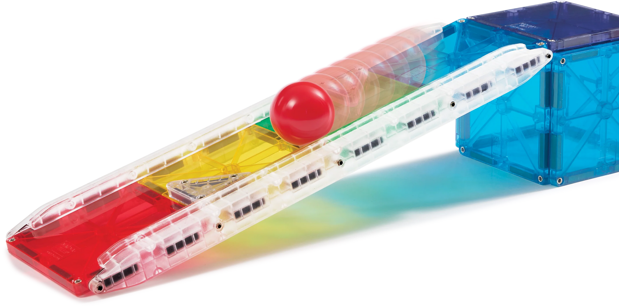 Toy magnet set with colorful track and red ball on a white background