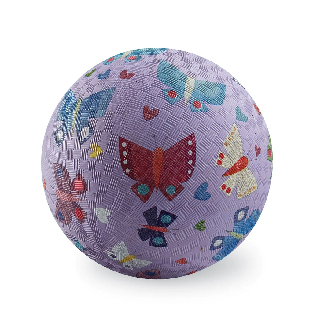 Purple ball with butterfly pattern on a white background
