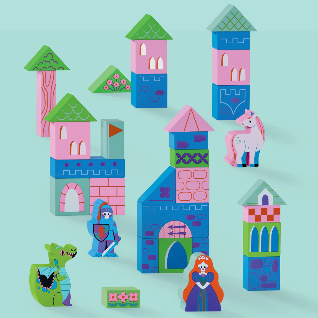 Colorful toy castle blocks with characters on a light blue background