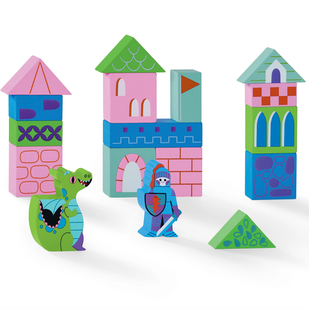 Colorful toy blocks with castle design and small figures on a white background