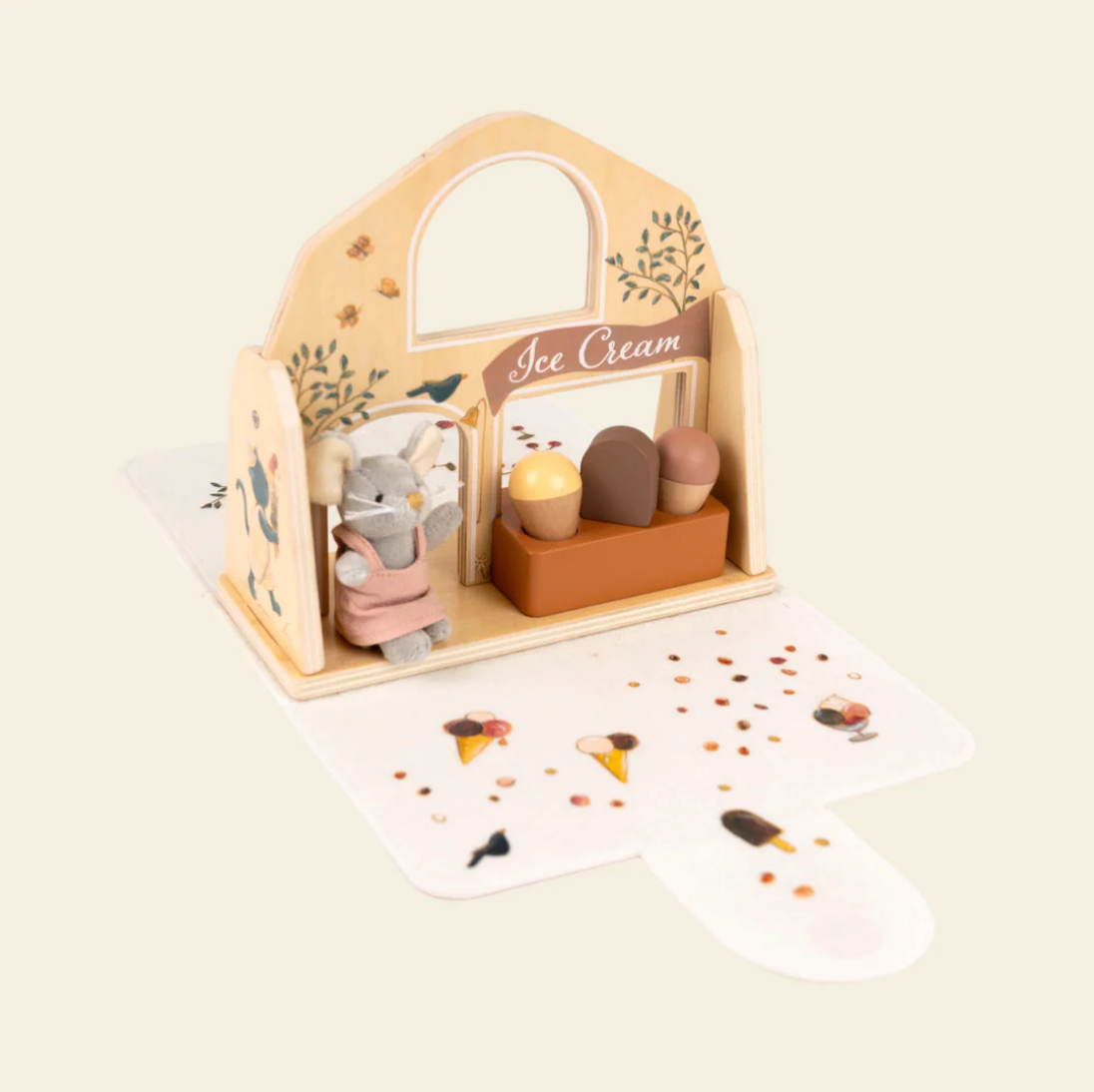 Wooden toy ice cream shop with mouse character and ice cream cones on a white background