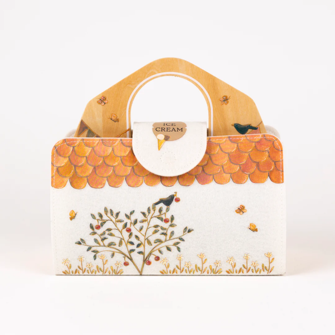 Decorative box with a scalloped edge and nature-themed design on a white background