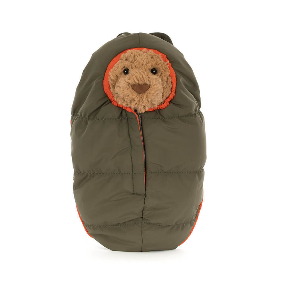 Green sleeping bag with a bear inside on a white background