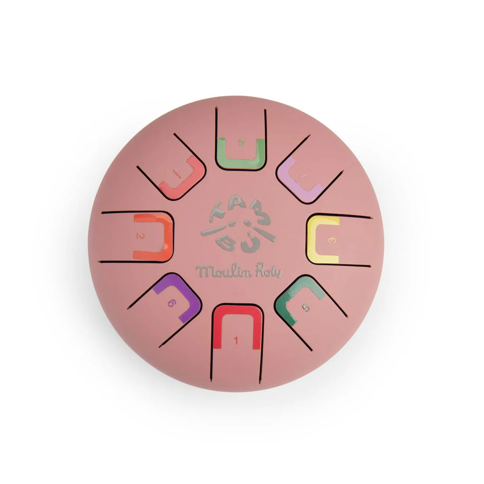 Round drum with colorful swatches on a white background