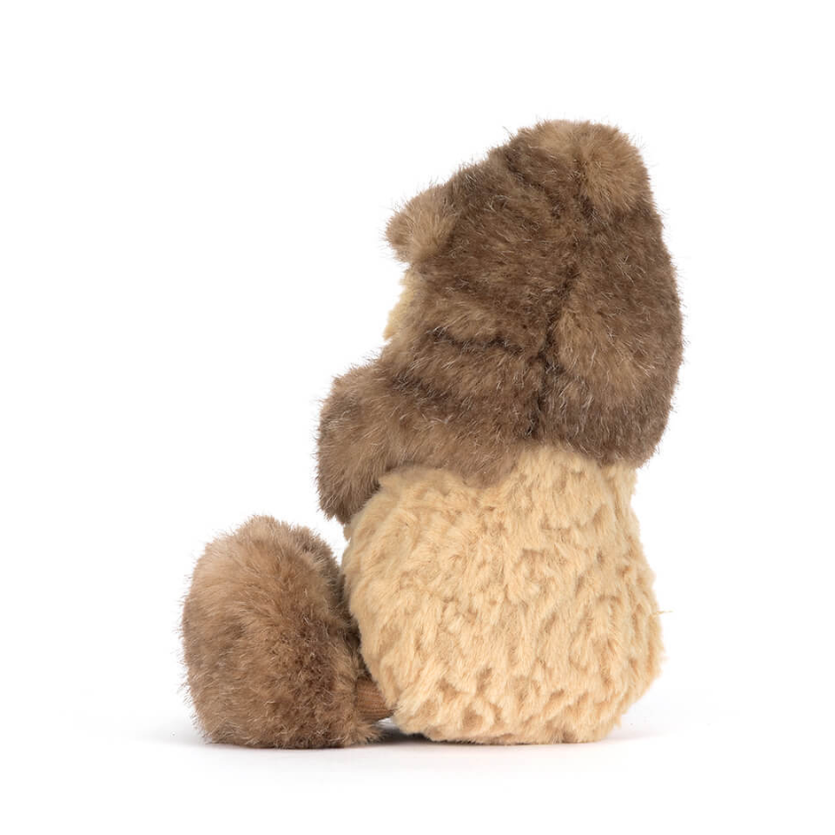 Stuffed animal toy with brown and beige fur on a white background