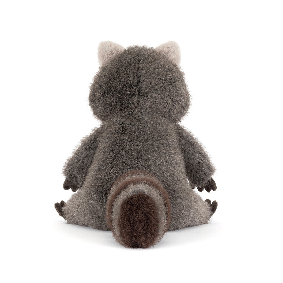 Plush toy raccoon on a white background