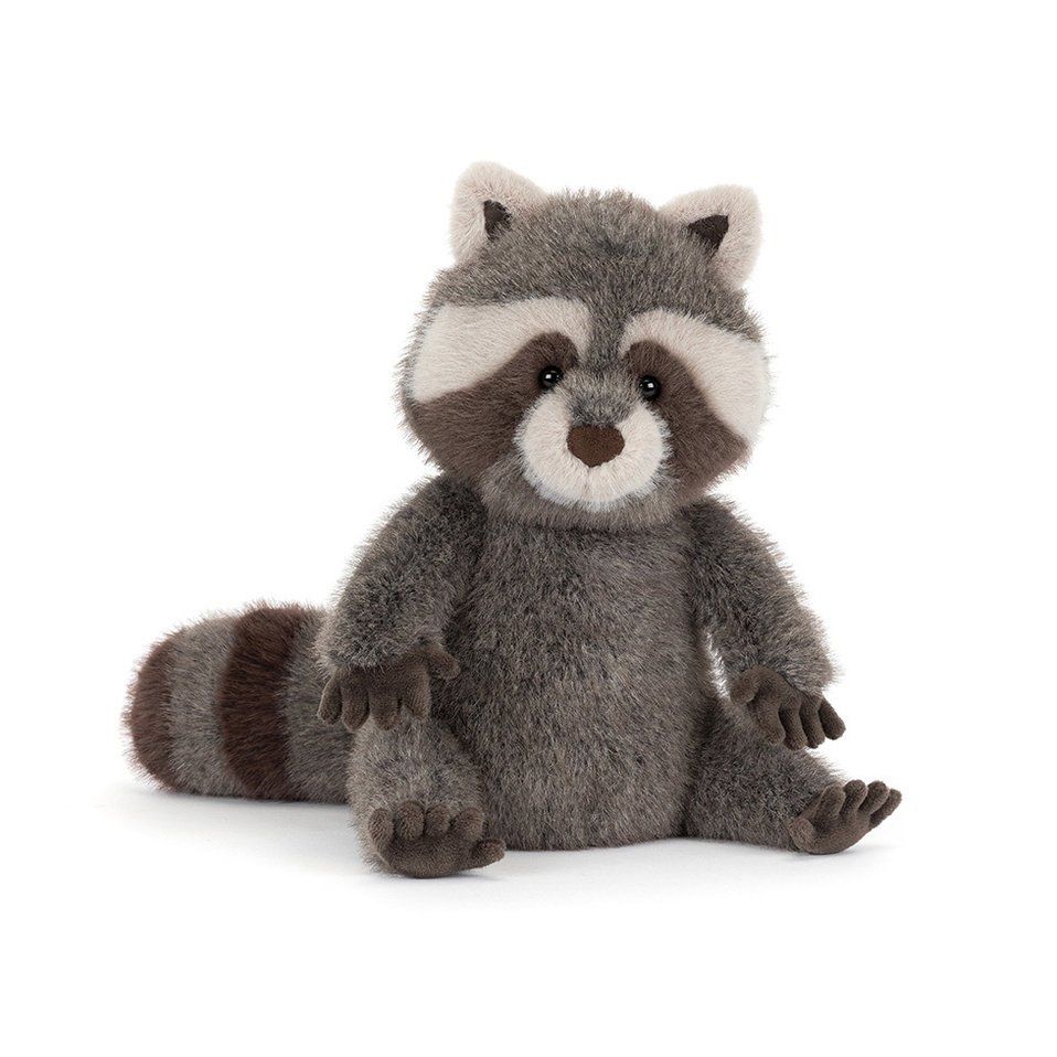 Plush raccoon toy on a white background