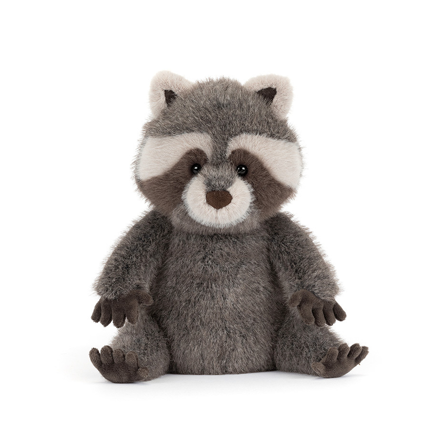 Stuffed animal raccoon toy on a white background