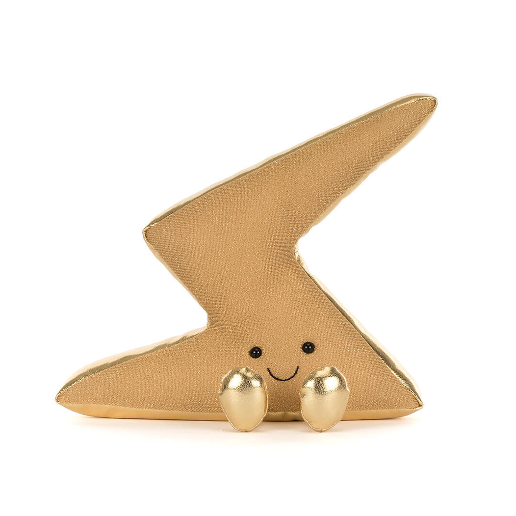 Gold lightning bolt-shaped plush toy with a smiling face on a white background