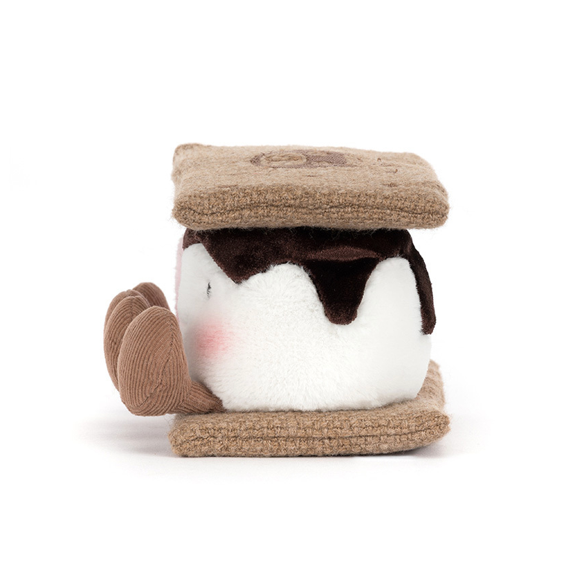 Small plush toy resembling a marshmello treat  on a white background