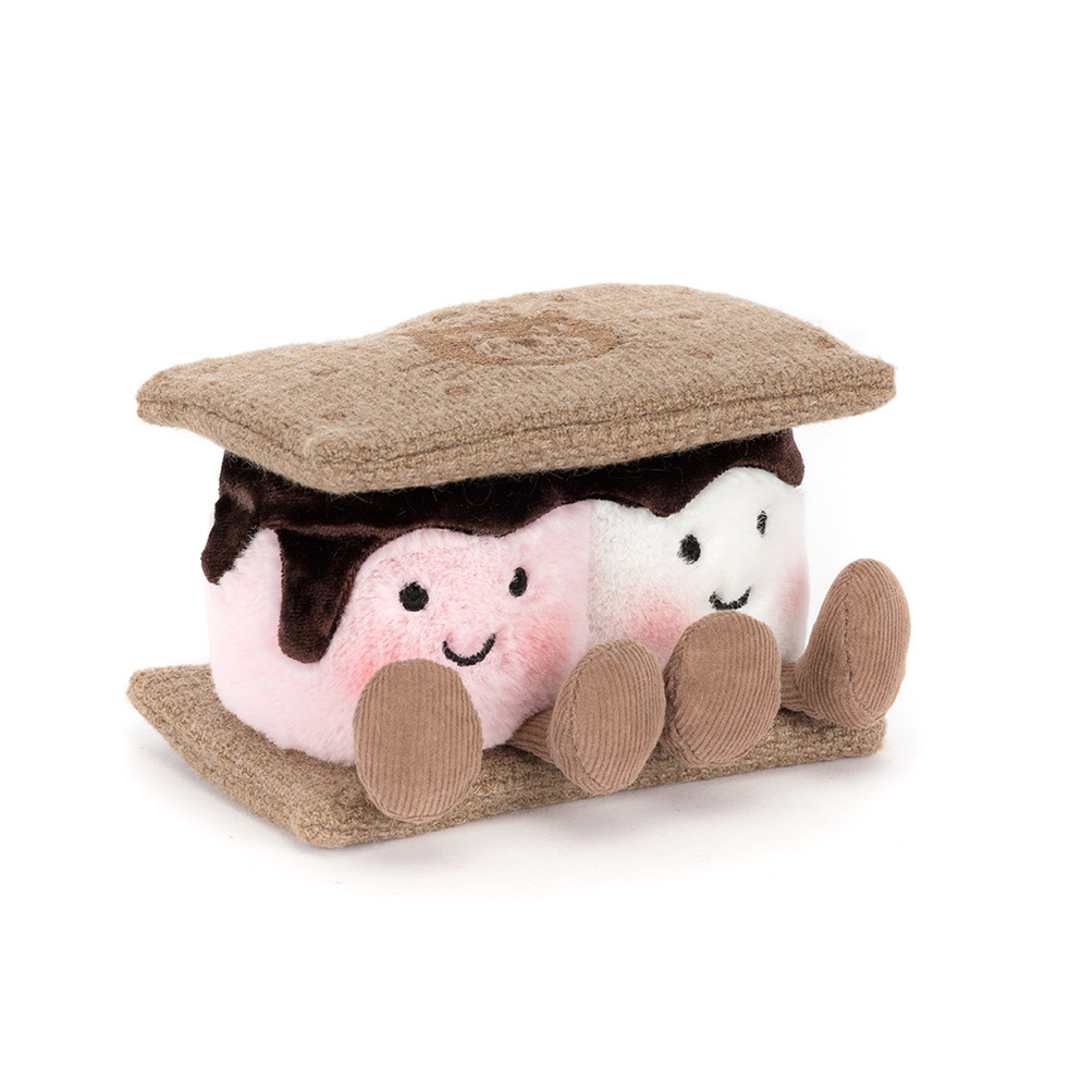 Plush toy resembling a s'more with two cute characters inside on a white background