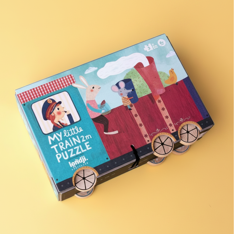 Children's puzzle train box with cartoon characters on a yellow background