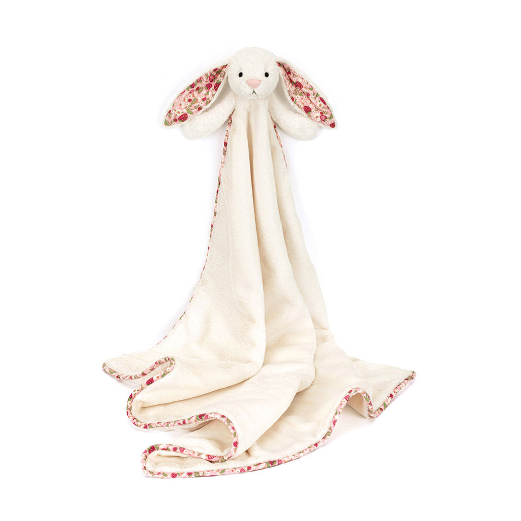 A cream-colored bunny-shaped security blanket with pink patterned trim and ears, shown on a white background with product text below.