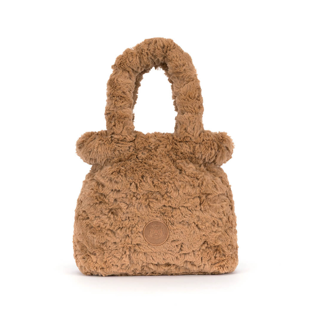 A brown fuzzy teddy-bear-inspired handbag centered on a white background, 