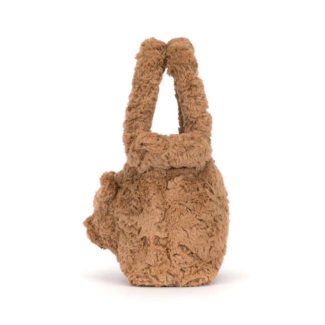 A brown plush teddy bear handbag displayed on a white background 