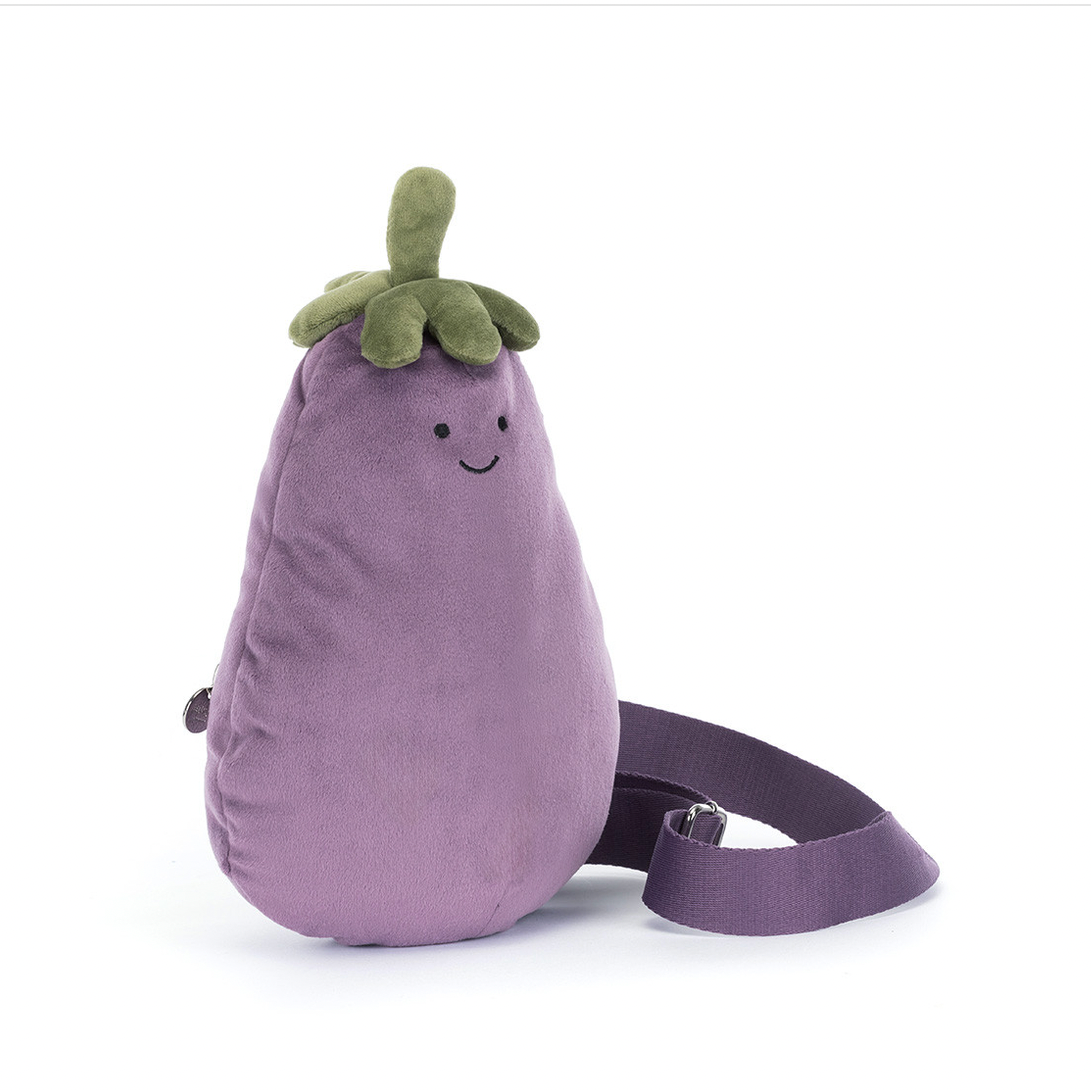 A plush eggplant-shaped shoulder bag in dusty purple with a green top and a dark purple strap, shown on a clean white background.