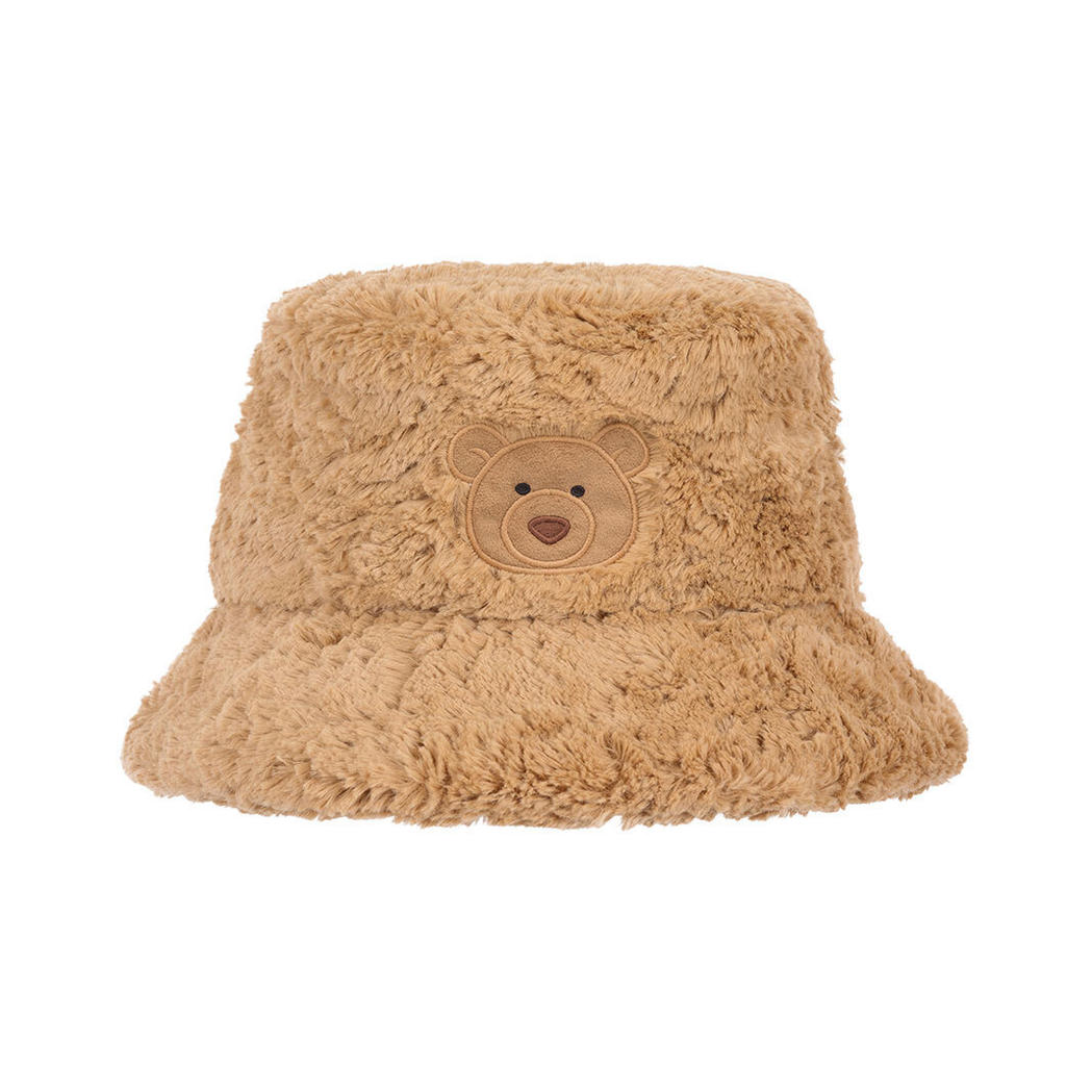 A light brown fluffy bucket hat with a bear face patch on the front, shown on a white background 