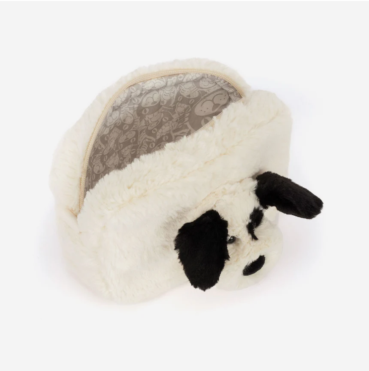 A plush dog-shaped pouch or small bag made of soft faux fur, shown open against a plain white background. The exterior is cream/off-white with black ears, nose, and eye details, and the inside lining has a subtle gray pattern.