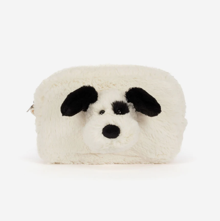 A fluffy faux-fur pouch shaped like a dog face, featuring black ears, nose, and eyes on a white background.