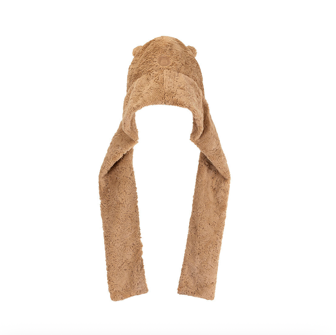 A plush teddy bear ear hat in a warm tan color, shown against a plain white background.