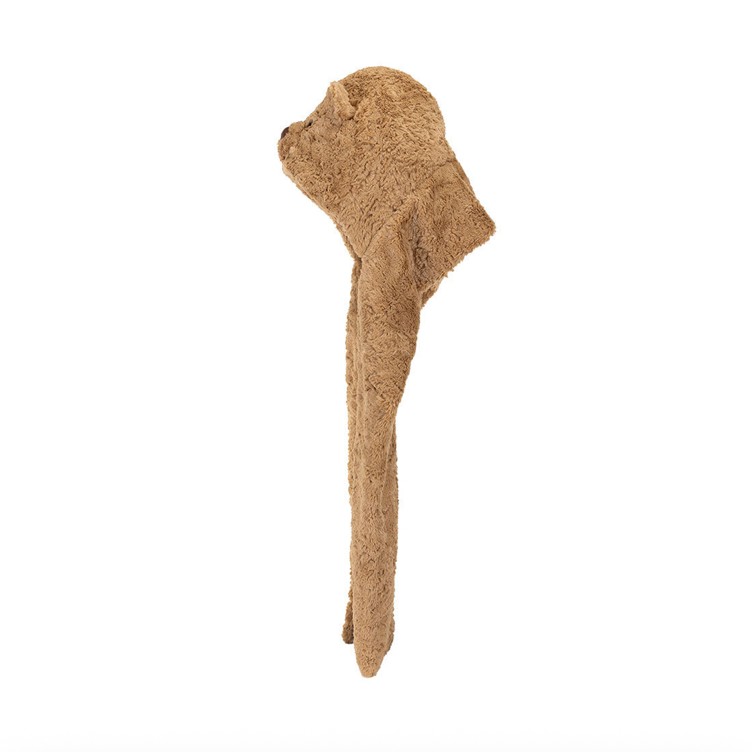 A small, plush, bear-shaped hat in a light beige color, shown against a plain white background.