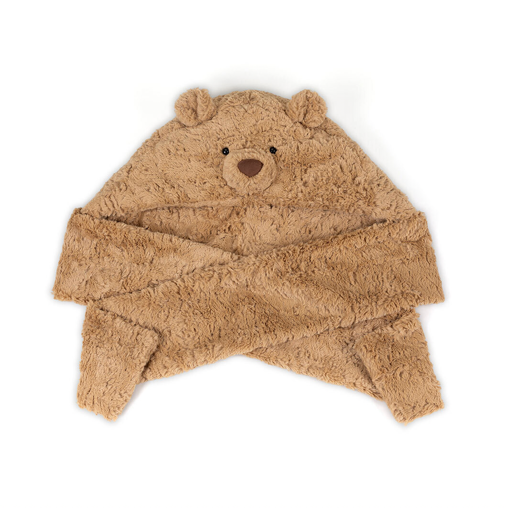 A plush brown hat shaped like a bear, featuring embroidered bear eyes and nose, shown against a plain white background.