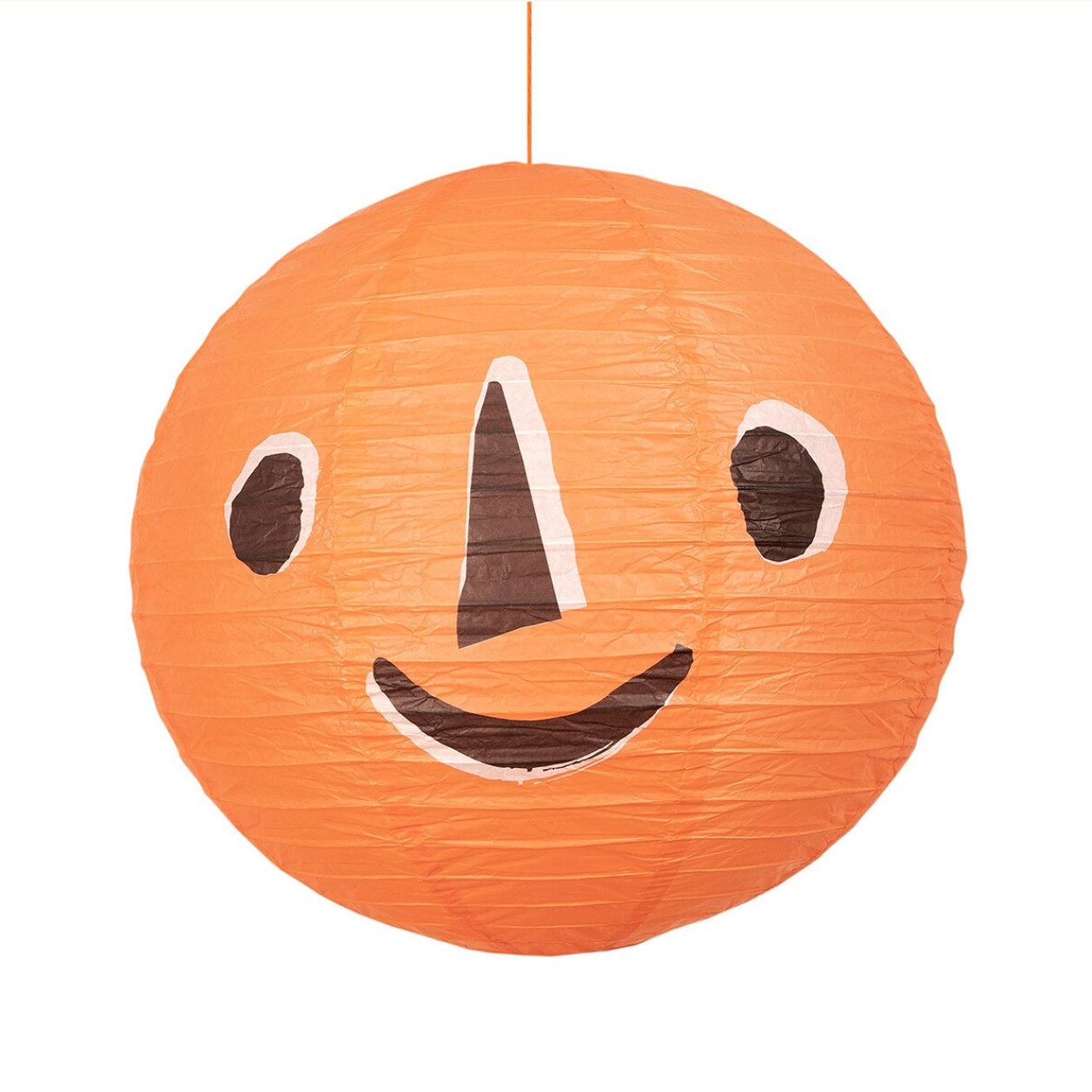 An orange paper lantern with a smiling face, hanging against a white background.