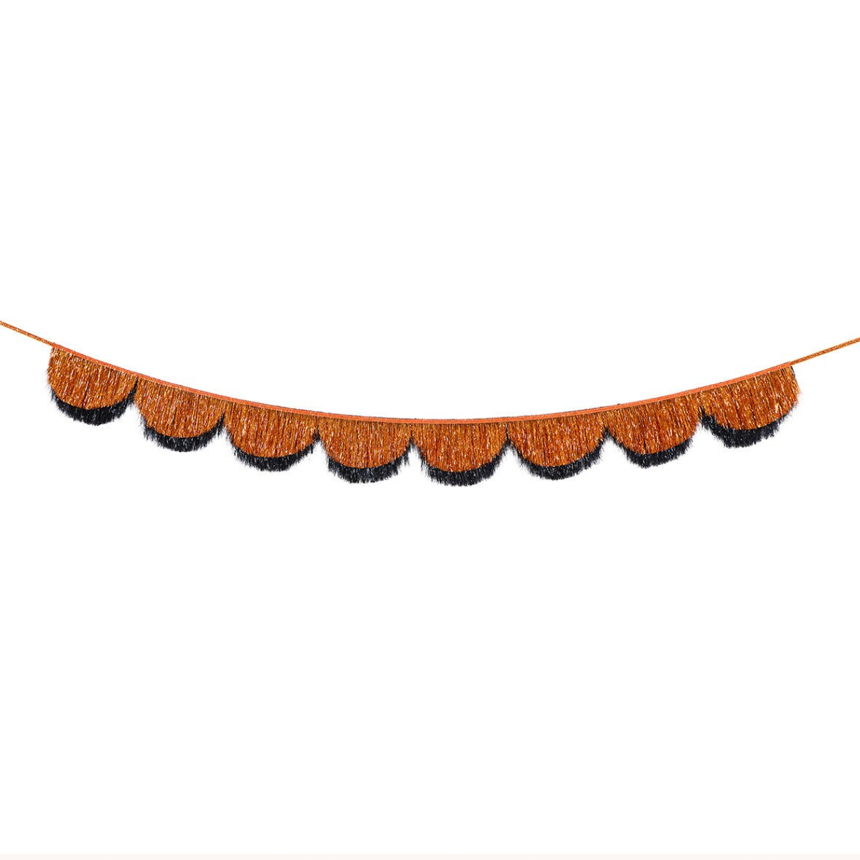 A decorative garland banner with scalloped fringe in a warm rust-brown color and black fringe along the underside, suspended on a thin string against a plain white background.
