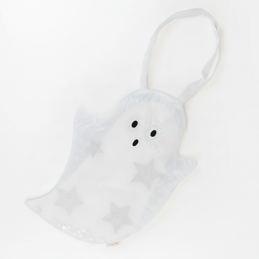 A ghost-shaped white fabric bag with a hanging loop, featuring embroidered black eyes and nose and silver glittery star accents on a plain white background.