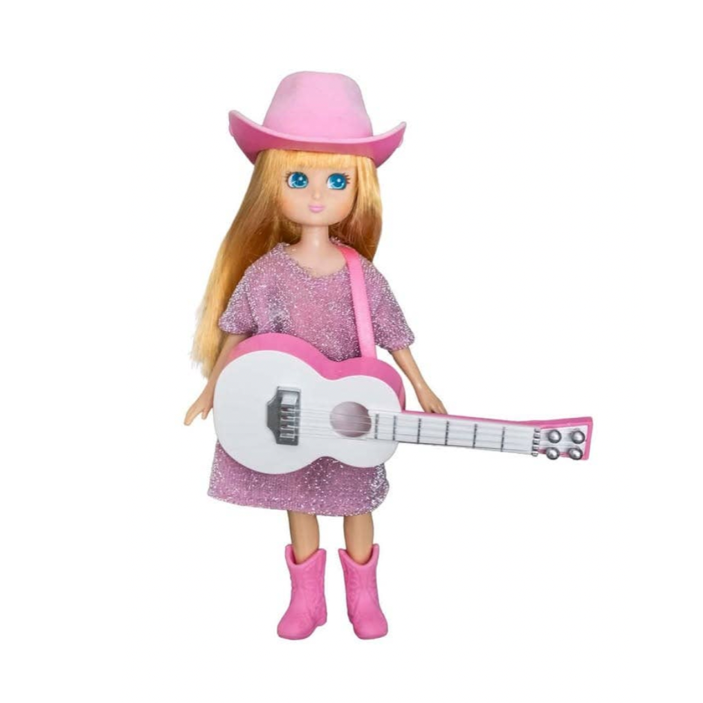 A doll with long blonde hair wearing a pink cowboy hat, pink dress, and pink boots, holding a white guitar, shown on a black background with a video player interface visible on the right.